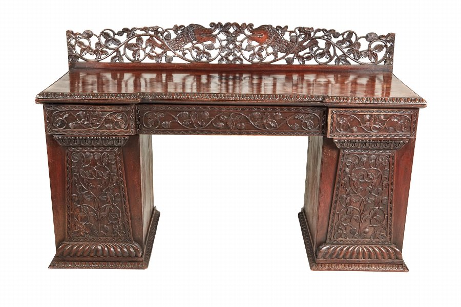Carved Anglo Indian padouk pedestal sideboard