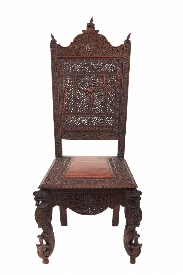 Unusual profusely pierced carved Indian rosewood side chair