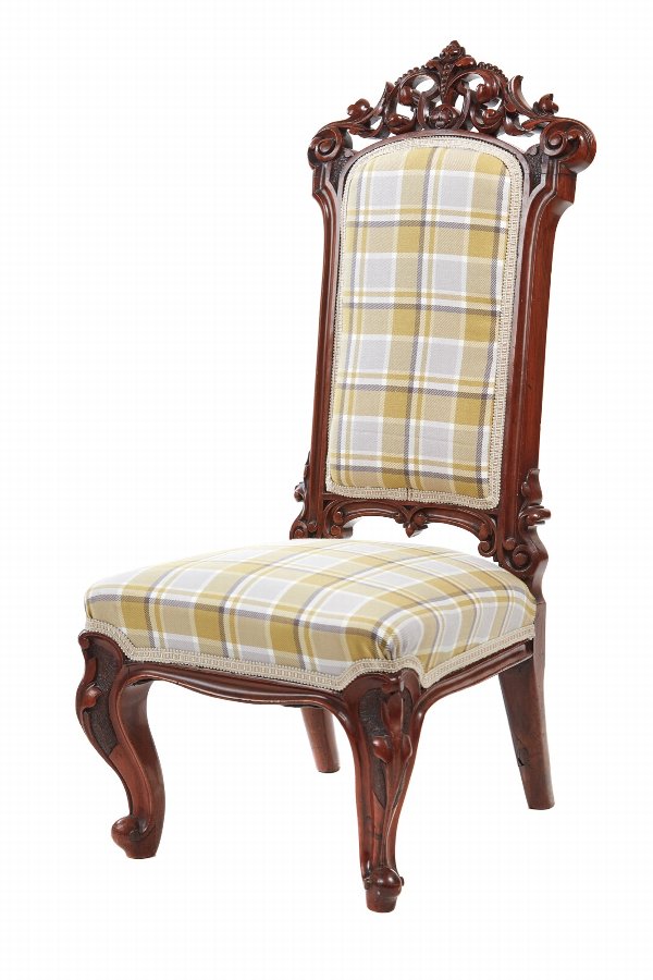 Outstanding quality carved walnut nursing chair 