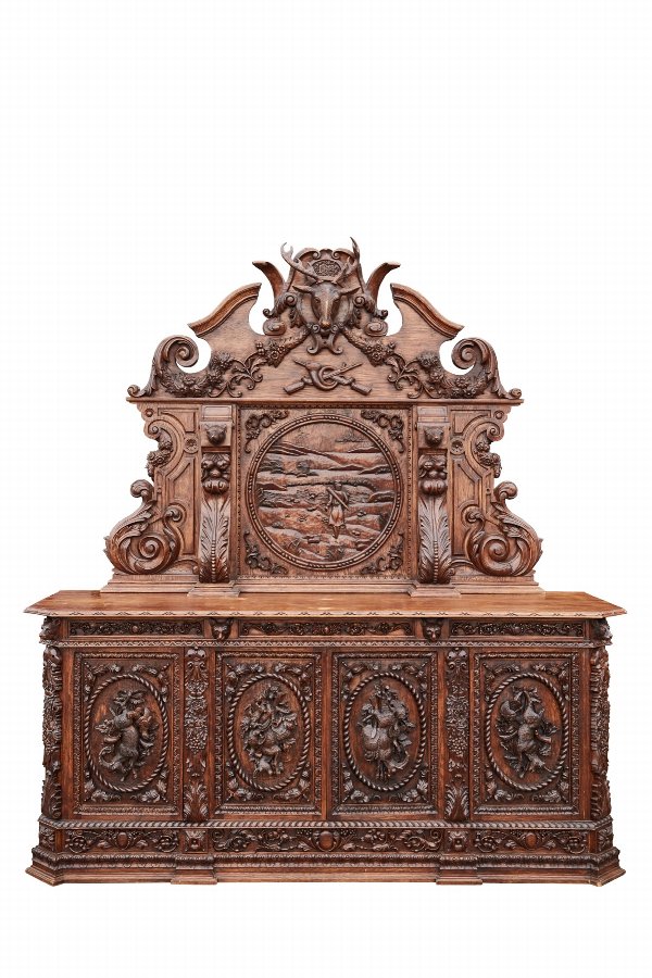 A LARGE AND IMPRESSIVE CARVED OAK BARONIAL SIDEBOARD