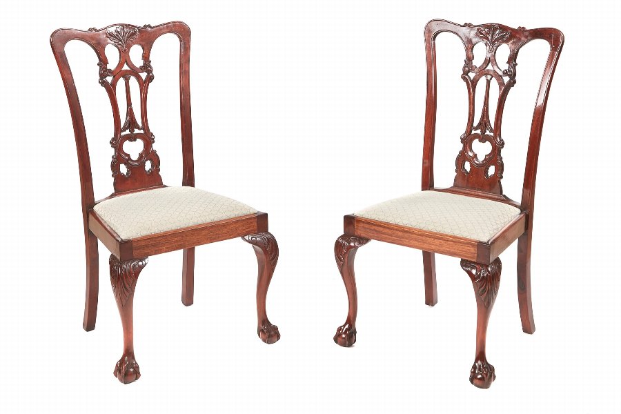Pair Of Antique Carved Mahogany Side Chairs