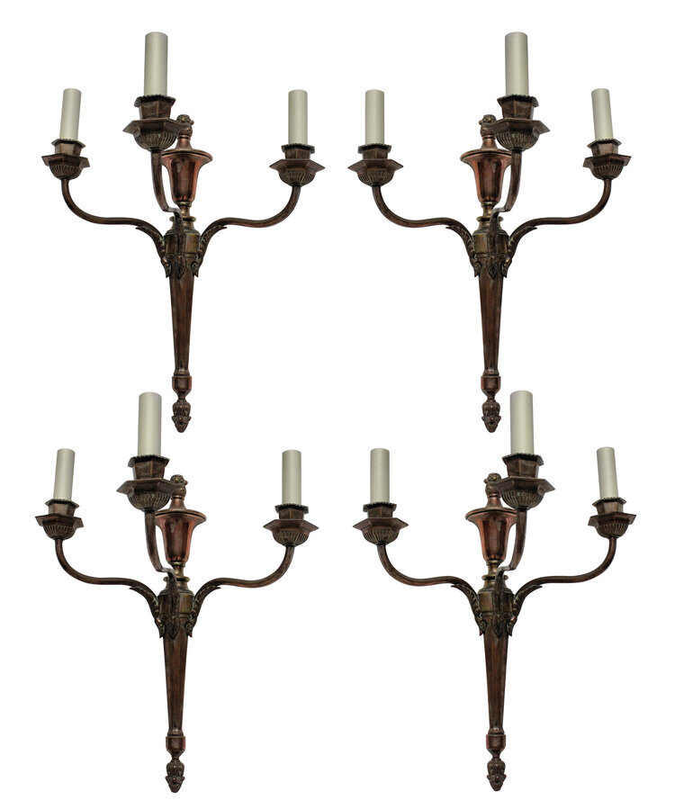FOUR BRONZED NEO-CLASSICAL THREE BRANCH SCONCES