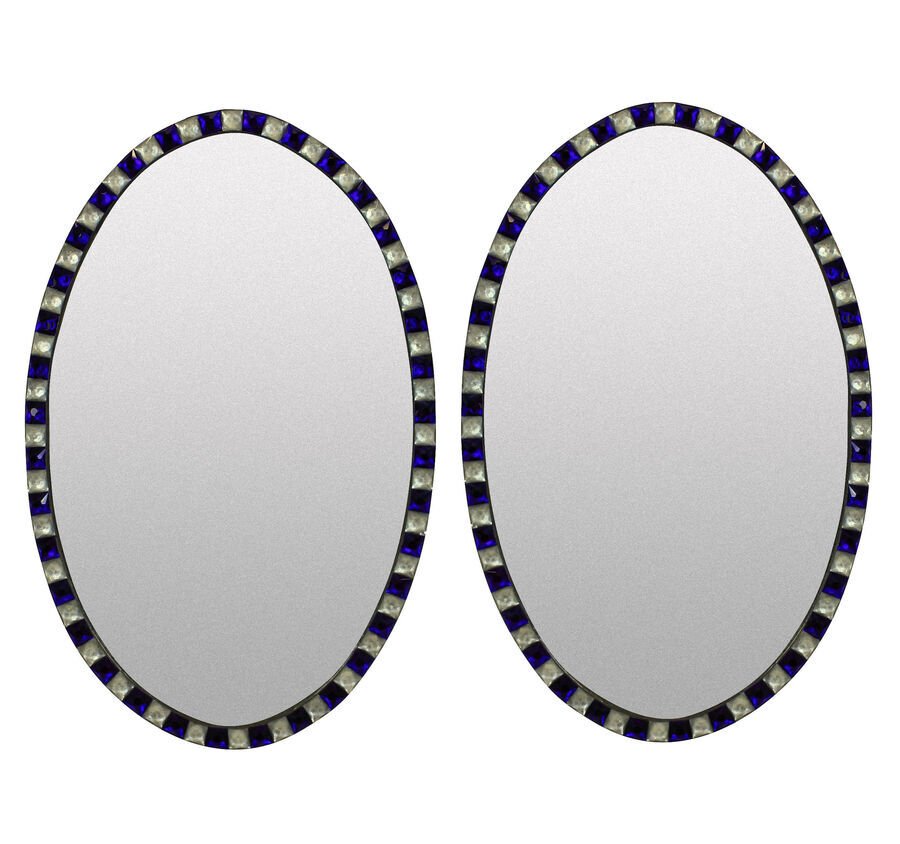 A PAIR OF GEORGIAN STYLE IRISH MIRRORS WITH COBALT BLUE GLASS & ROCK CRYSTAL FACETED BORDERS