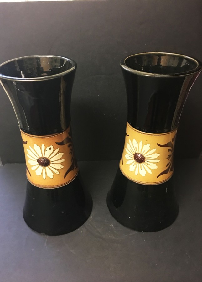 Two black and brown ground Langley vases.