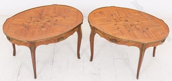 A Pair of French Walnut Coffee Tables