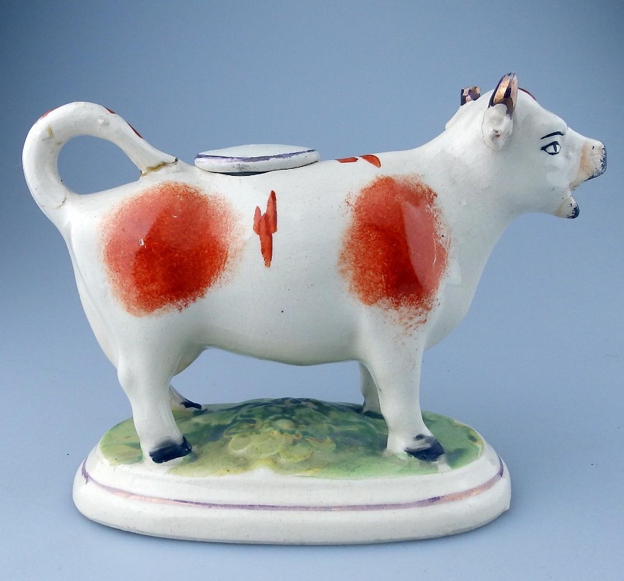Staffordshire Antique Pottery an attractive russet Cow Creamer - C.19thC
