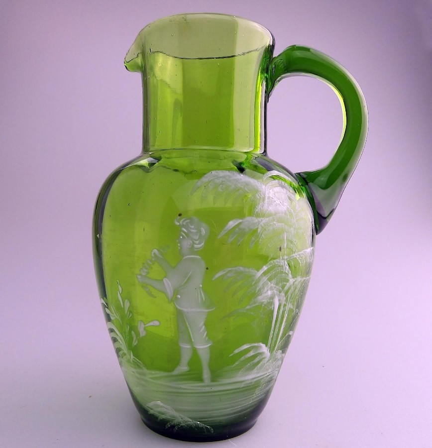 Antique Victorian Coloured Glass A green Mary Gregory boy hand enameled Jug C.19thC