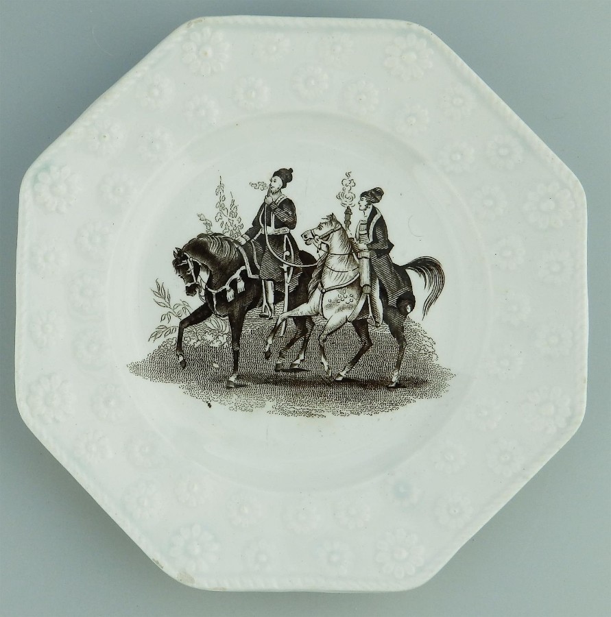 Antique Pottery an unusual Persian themed Nursery Plate - daisy border C.19thC