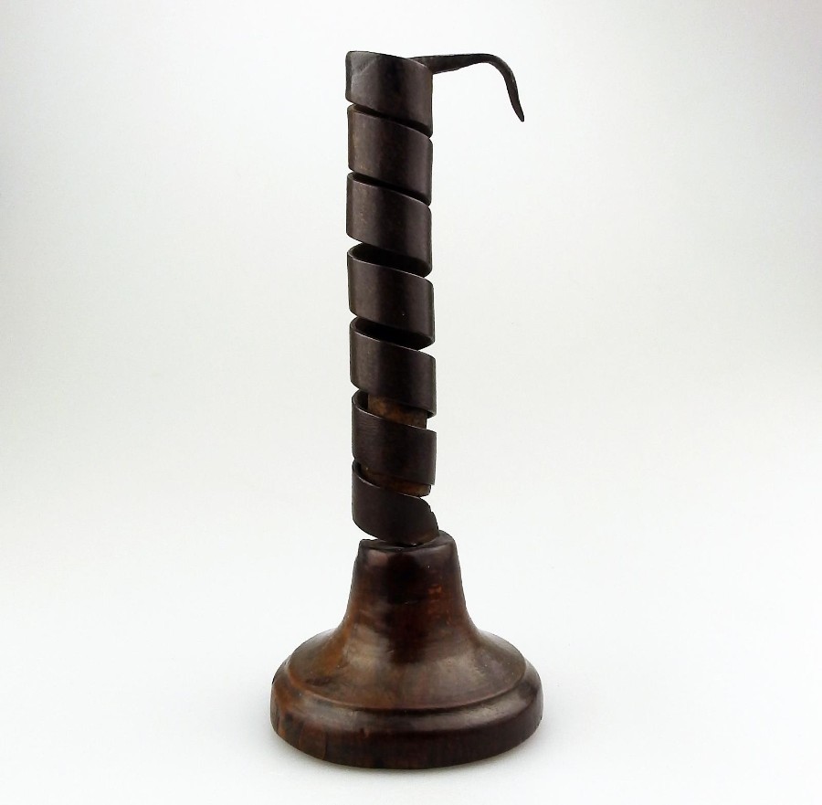 Antique Lighting : a rare coiled steel and fruitwood Rat de Cave Candlestick C.18th century  