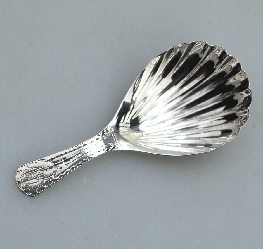 An antique Georgian solid silver Caddy Spoon, having shell bowl C.1793
