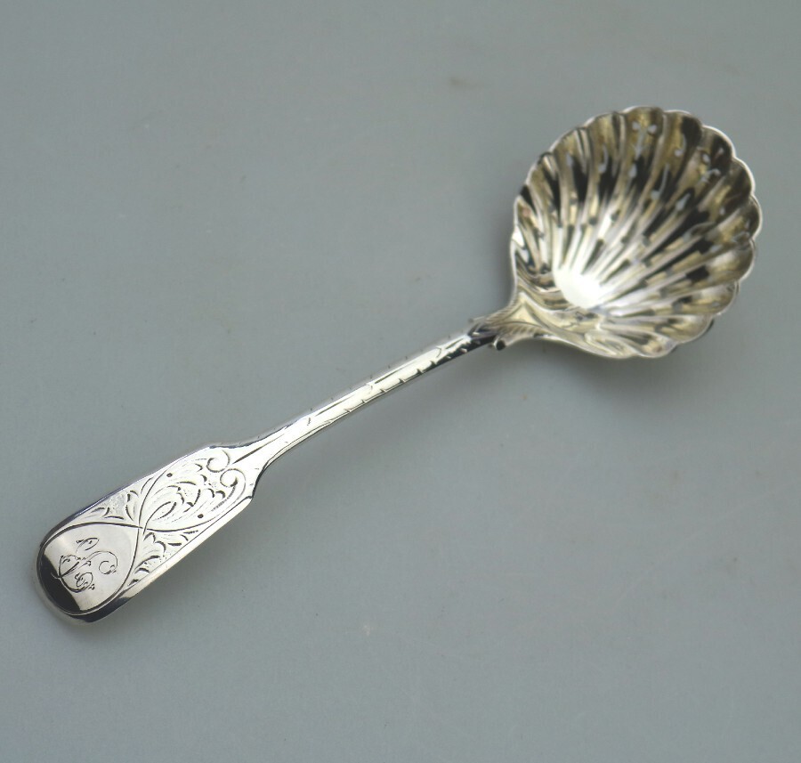 An antique solid silver engraved Sifter Ladle by Robert Stebbings C.1902