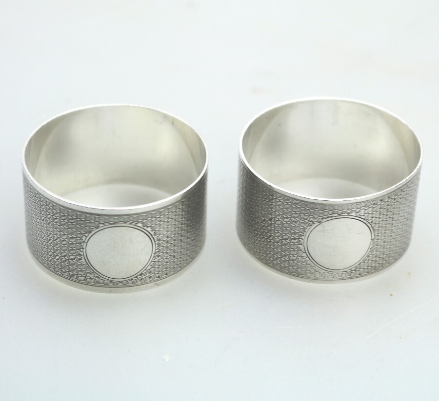 A very fine pair antique Art Deco solid silver Napkin Rings by W H Haseler C.1924