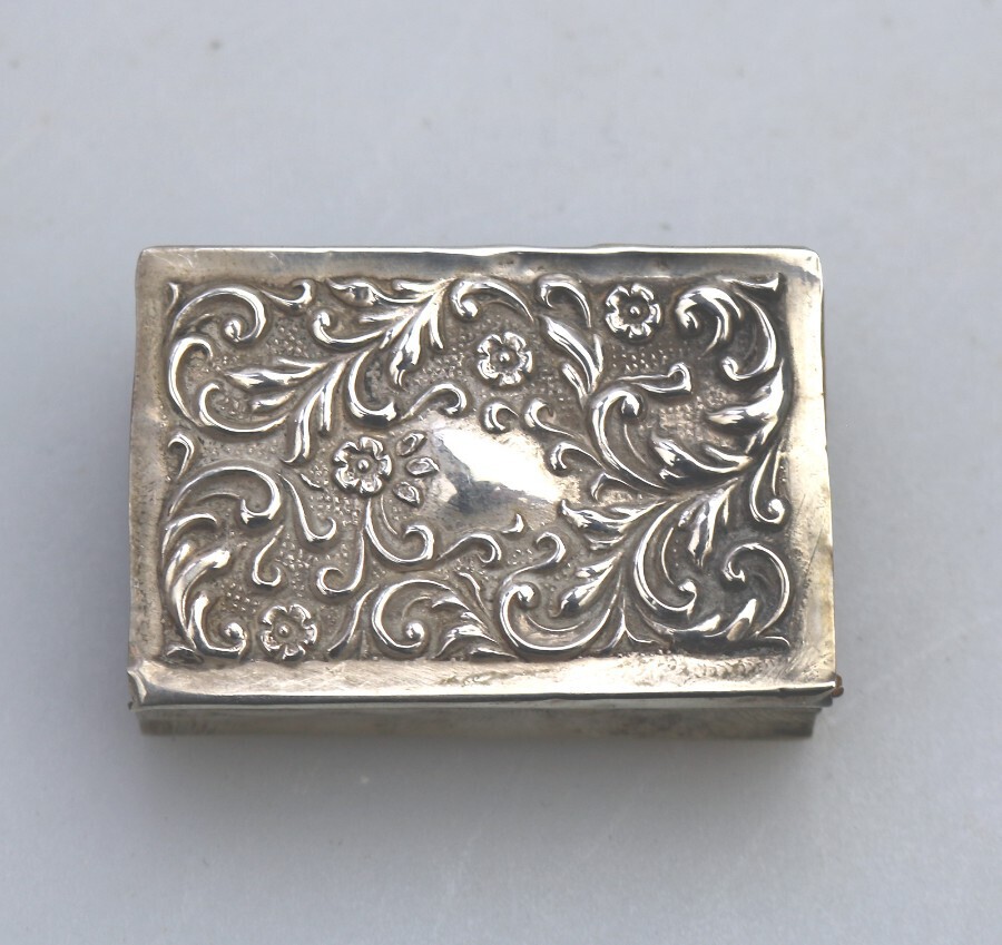 An antique solid silver repousse Matchbox Cover Birmingham 1904