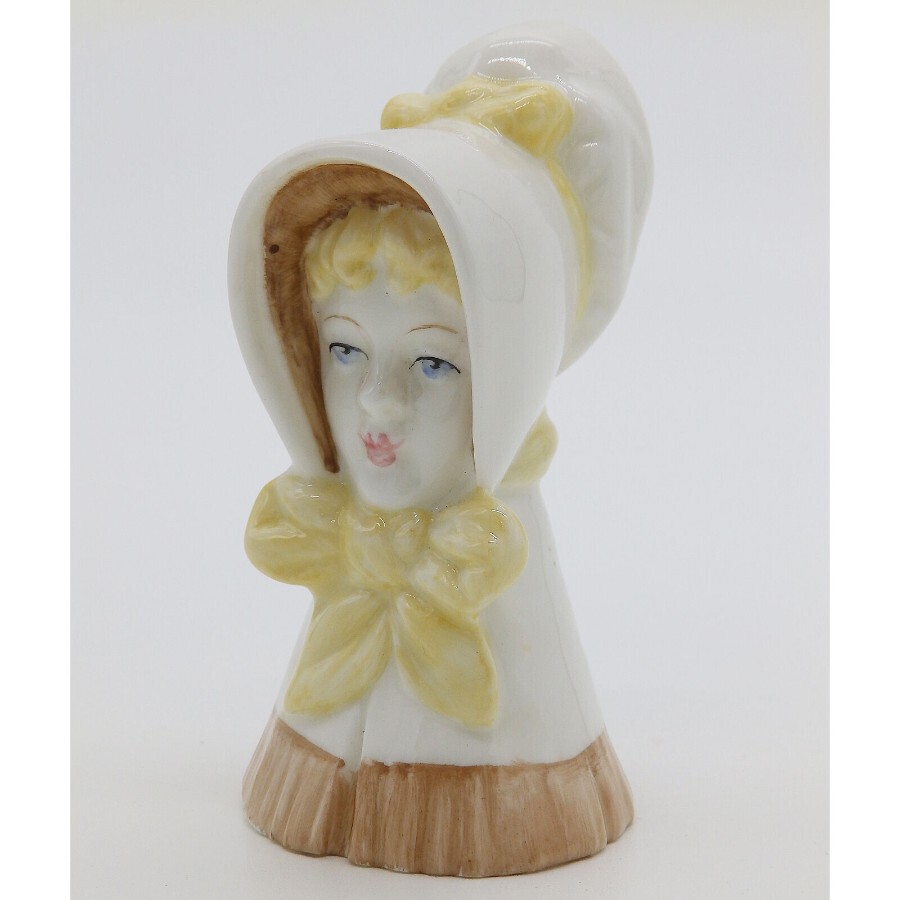 A fine vintage Royal Worcester young girl candle Snuffer c.20thC