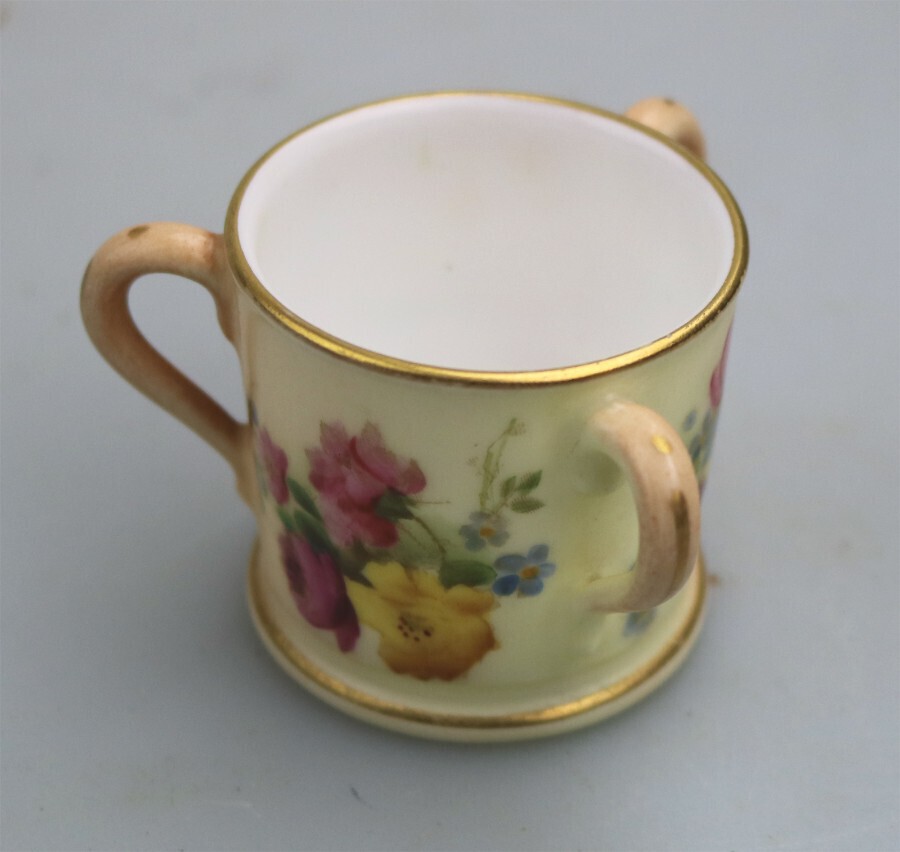 An antique Royal Worcester novelty porcelain hand painted miniature Tyg C.1903
