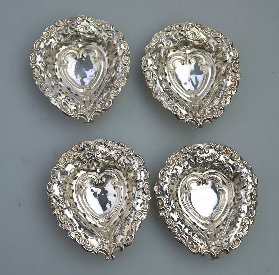 A set of 4X antique solid silver novelty Heart stamped Dishes William Devenport C.1912-13