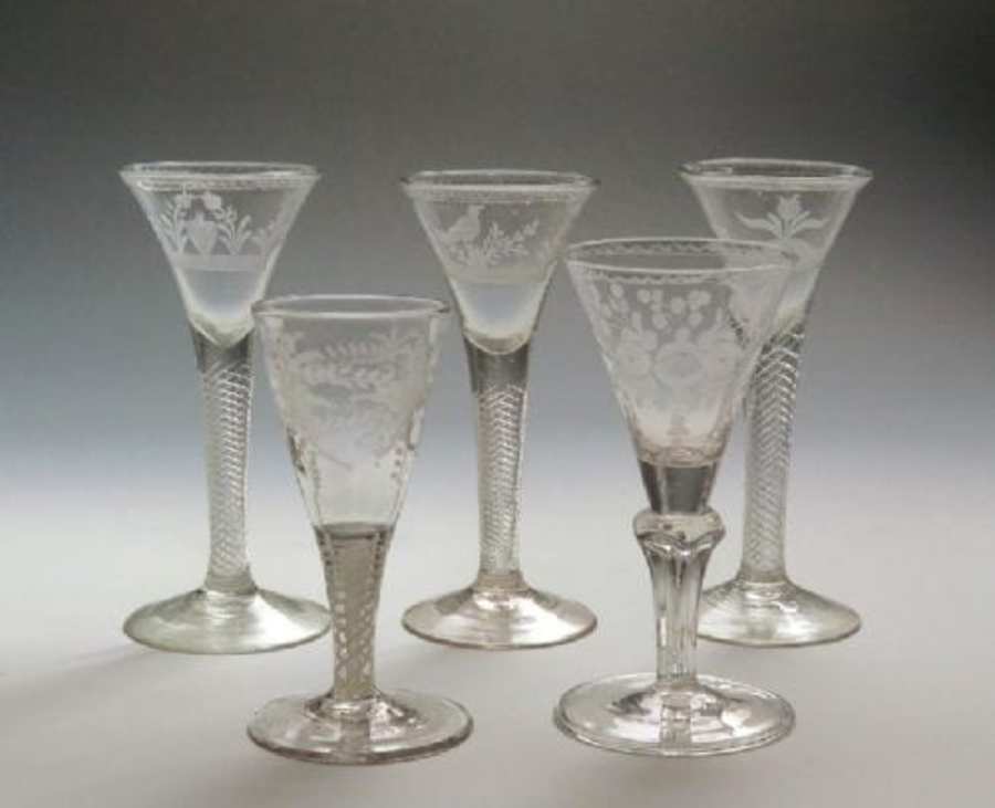 Five engraved airtwist wine glasses 18th cent