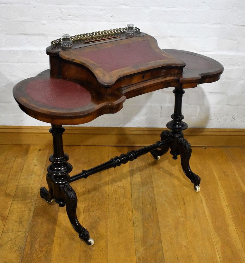 A Victorian Burr Walnut Kidney top Writing table