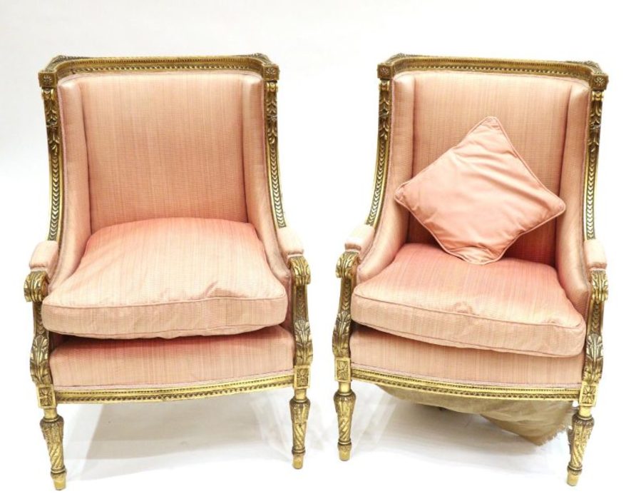 A Pair of Louis XV Style Carved Giltwood Fauteuils,