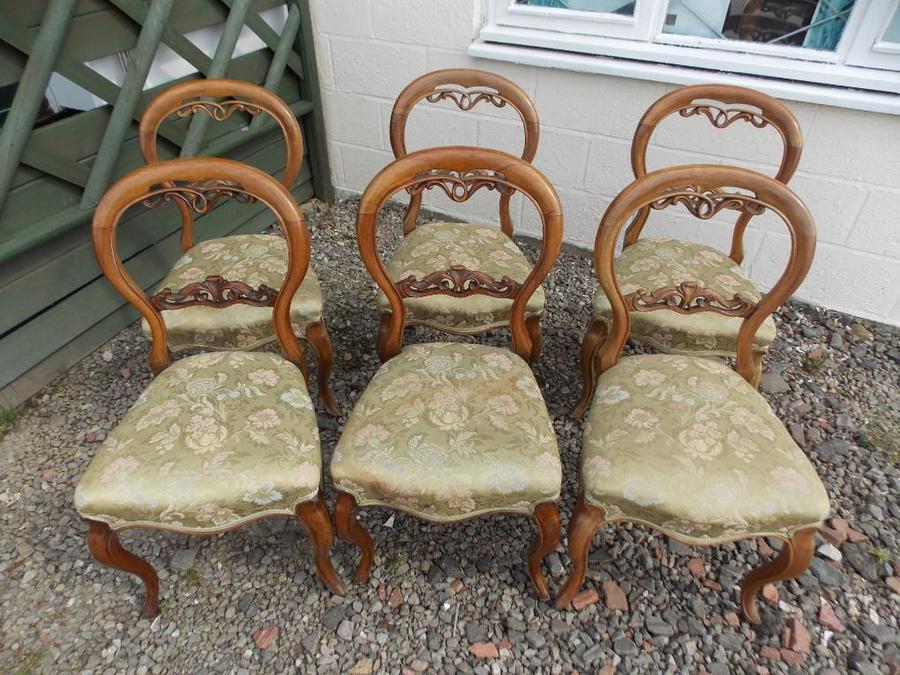 SOLD Set of six Victorian walnut dining chairs.