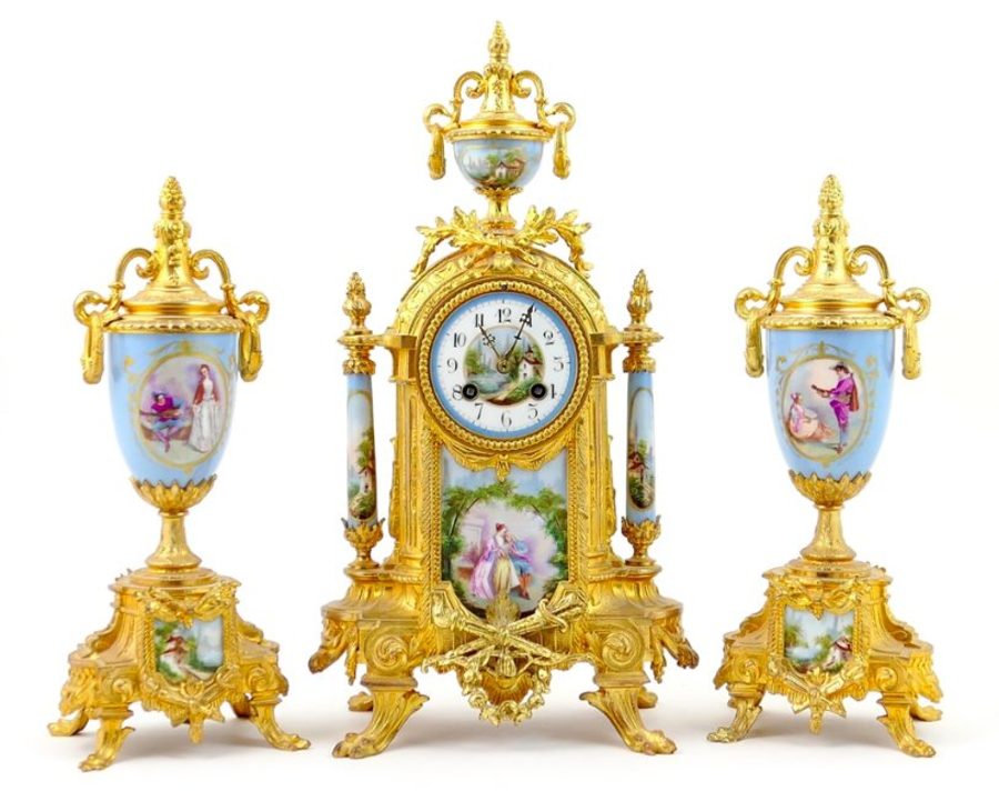 French gilded metal and porcelain clock garniture, circa 1885,