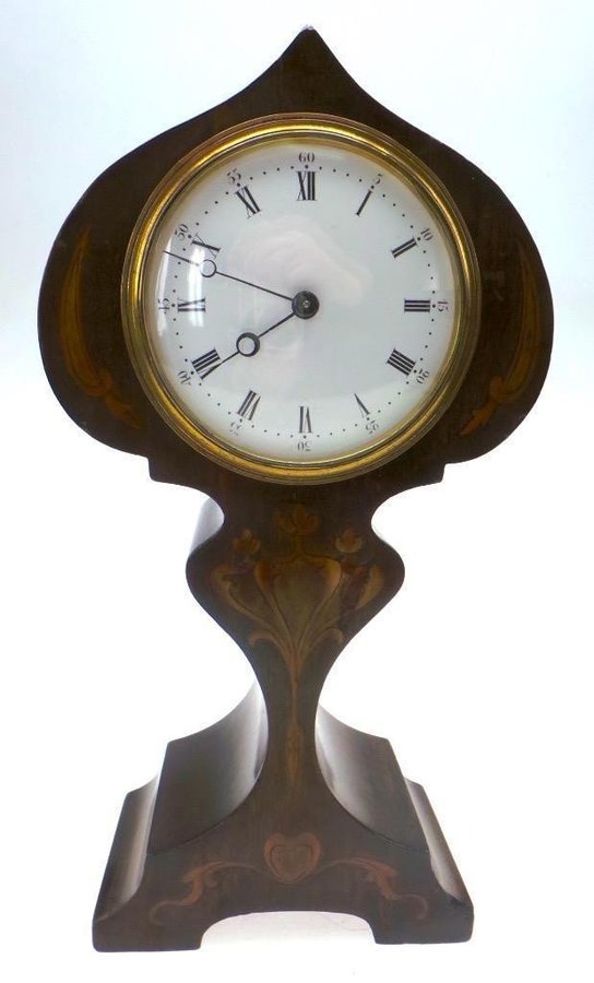 Edwardian mahogany tulip mantle clock