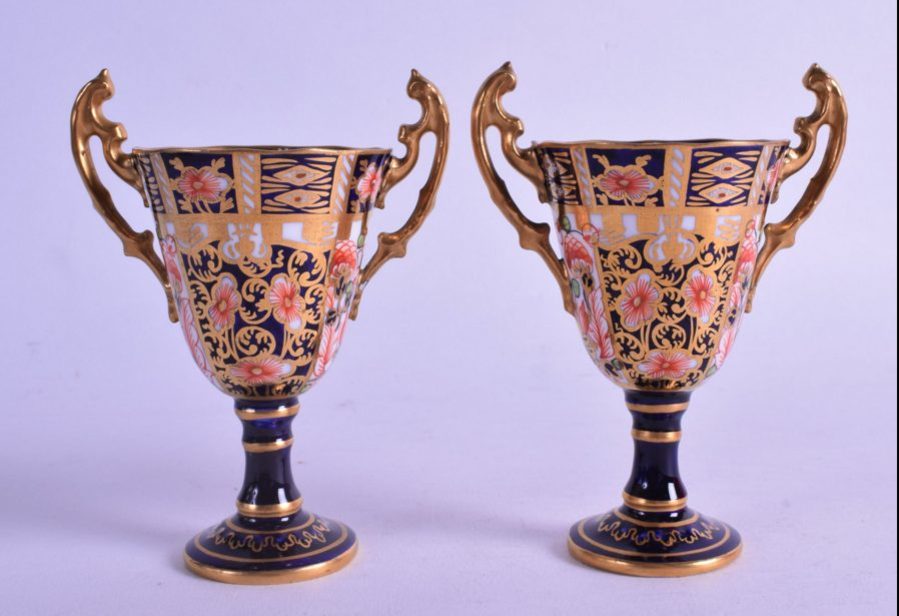 PAIR OF ROYAL CROWN DERBY TROPHY SHAPED VASES