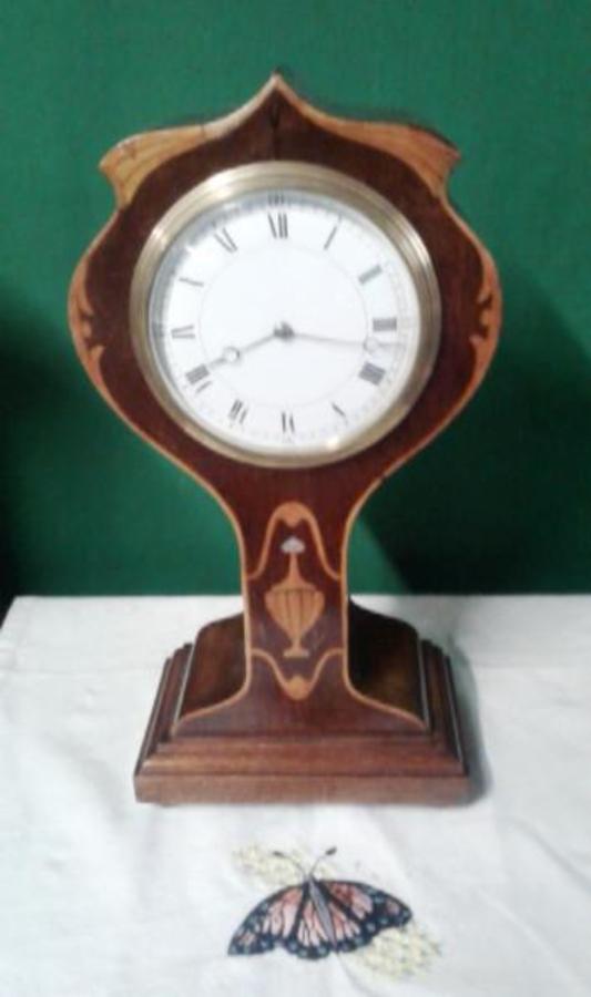 Edwardian inlaid mahogany tulip mantle clock