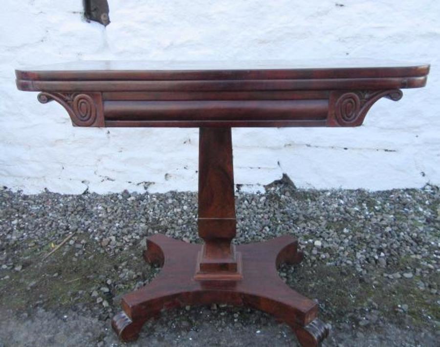 William 1V rosewood fold over card table.