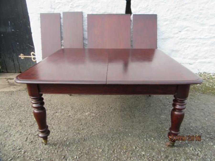 Large Victorian mahogany extending dining table