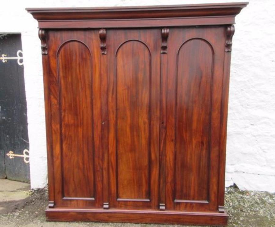 SOLD Early Victorian three door figured mahogany.