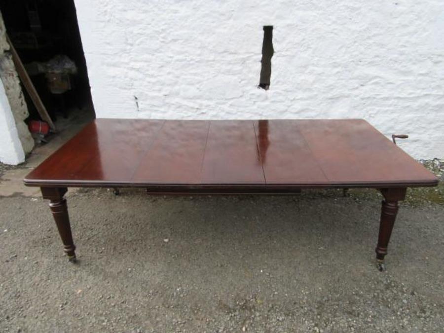 Victorian mahogany extending wind out table