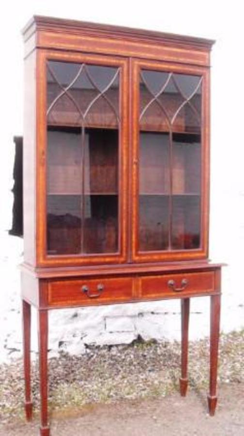 Edwardian astrigal glazed two door mahogany bookcase