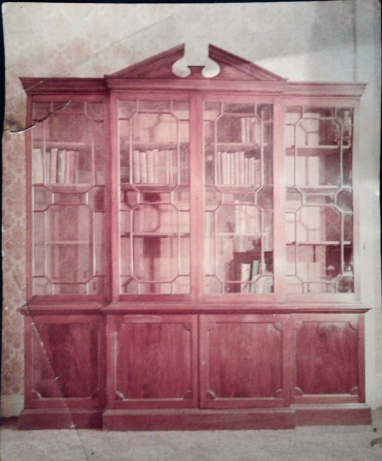 George 111 styled Four door breakfront mahogany bookcase.