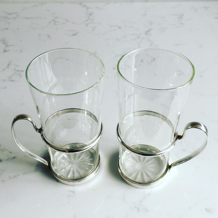 A pair of Sterling Silver Tea Glass Holders with inserts 1928 retailed by Garrard