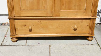 Antique Large 19th c continental pine knockdown hall cupboard with rail and drawer