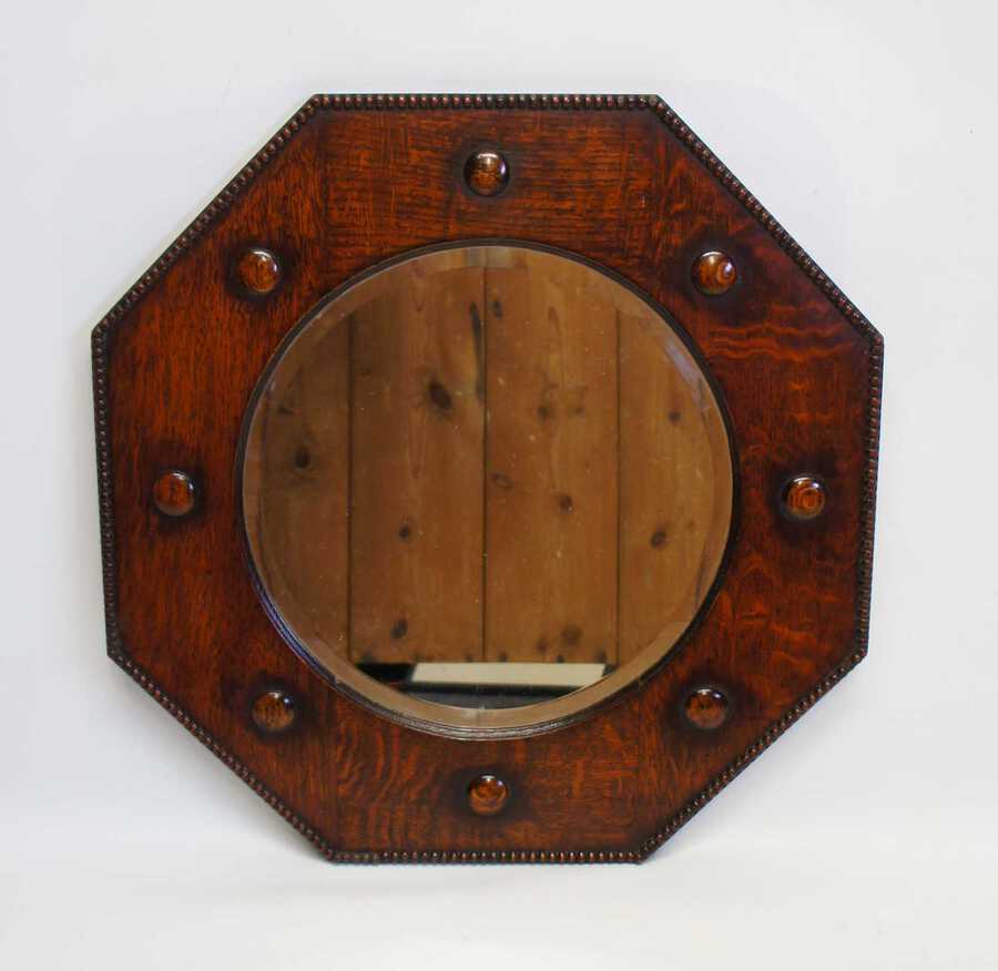 Antique Early 20th c Oak octagonal  bevel edged overmantle mirror