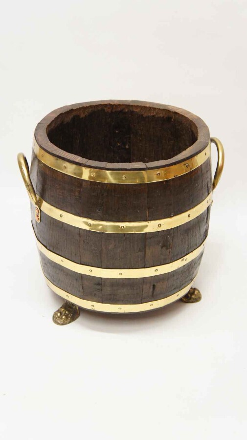 Early 20th c Coopered  fireside log  bucket or planter on brass feet