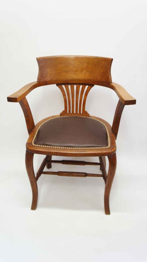 Early 20th century Oak office chair with leather seat pad 