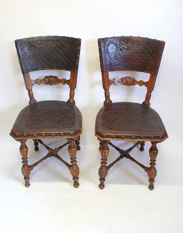 Pair of 19th c continental  Oak & studded/tooled  leather dining chairs
