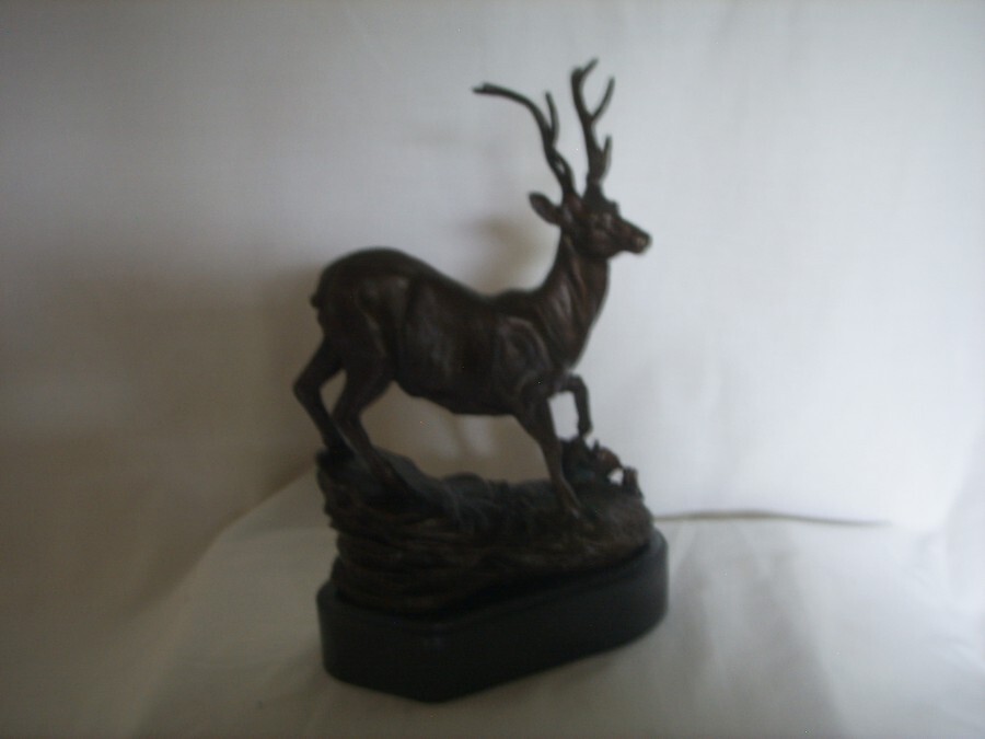 A lovely Bronze of a STAG on a ROCKY OUTCROP