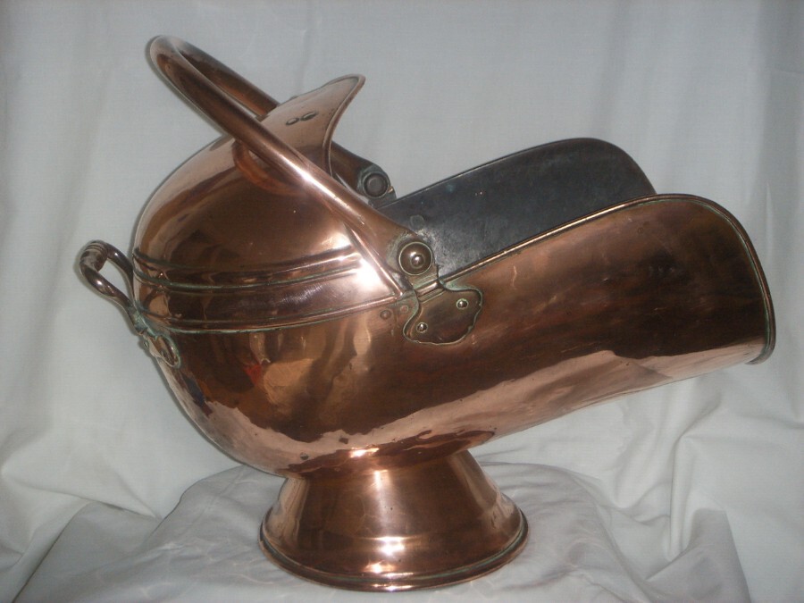 A nice Victorian Coal Scuttle with Brass Embellishments.