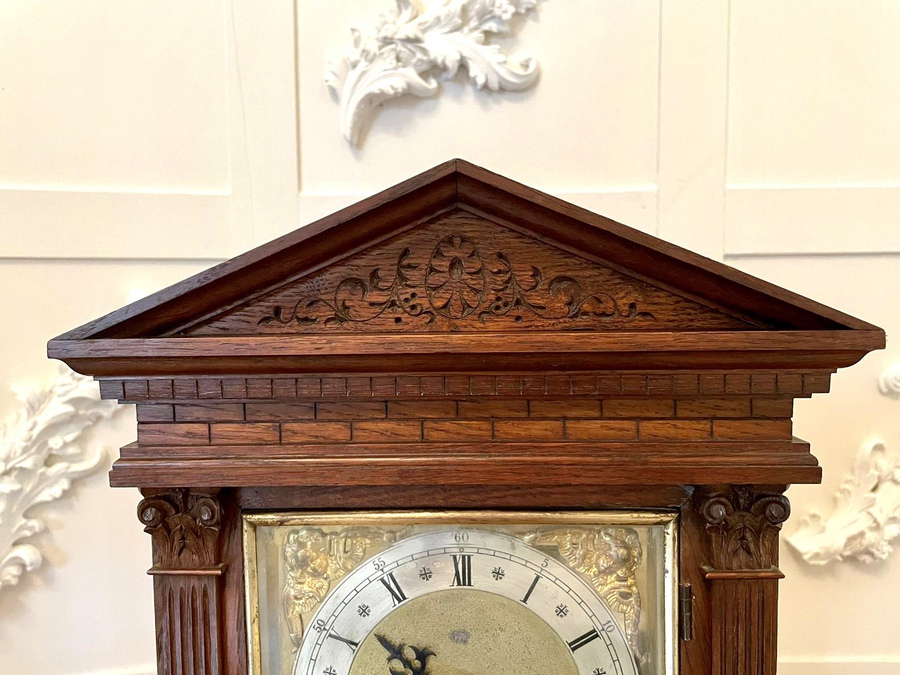 Antique Antique carved oak brass face eight day mantel clock