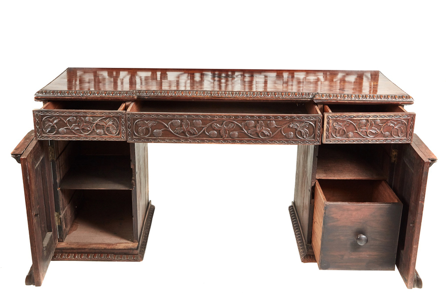 Antique Antique ornate small carved Anglo-Indian padauk inverted breakfront pedestal sideboard