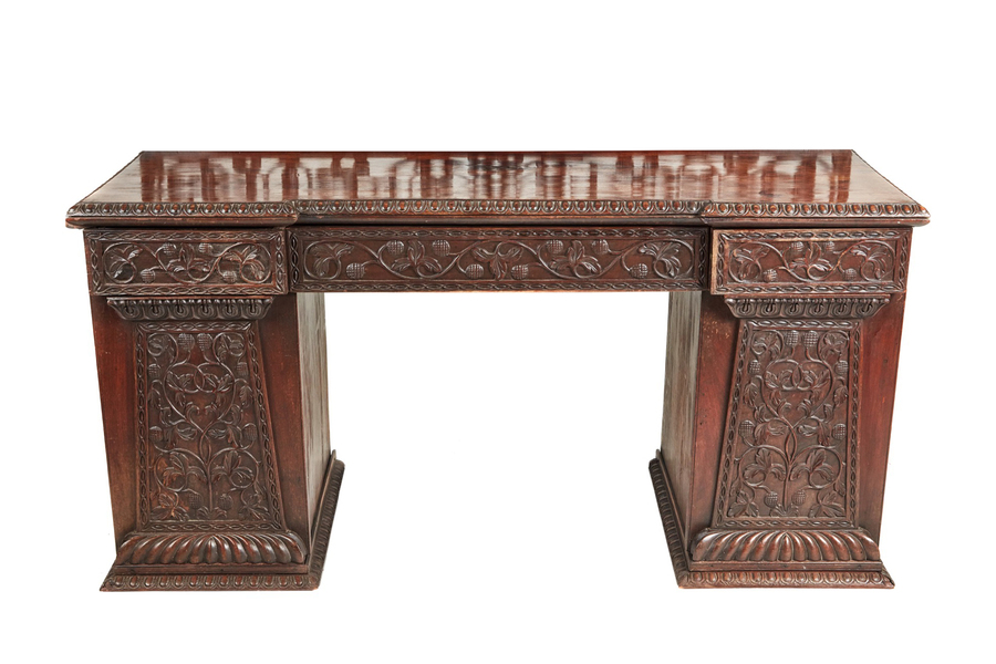 Antique Antique ornate small carved Anglo-Indian padauk inverted breakfront pedestal sideboard