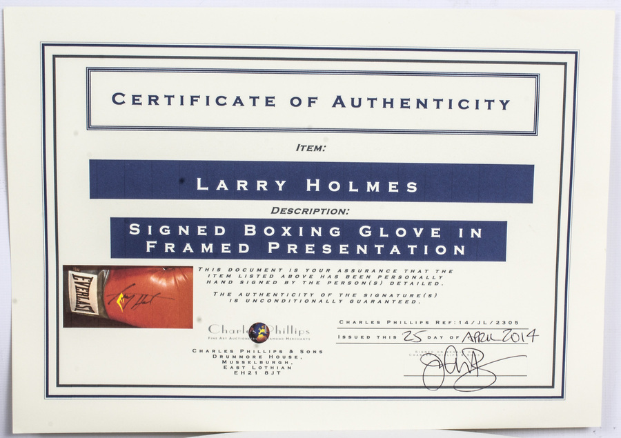 Antique Everlast boxing glove autographed by Larry Holmes 