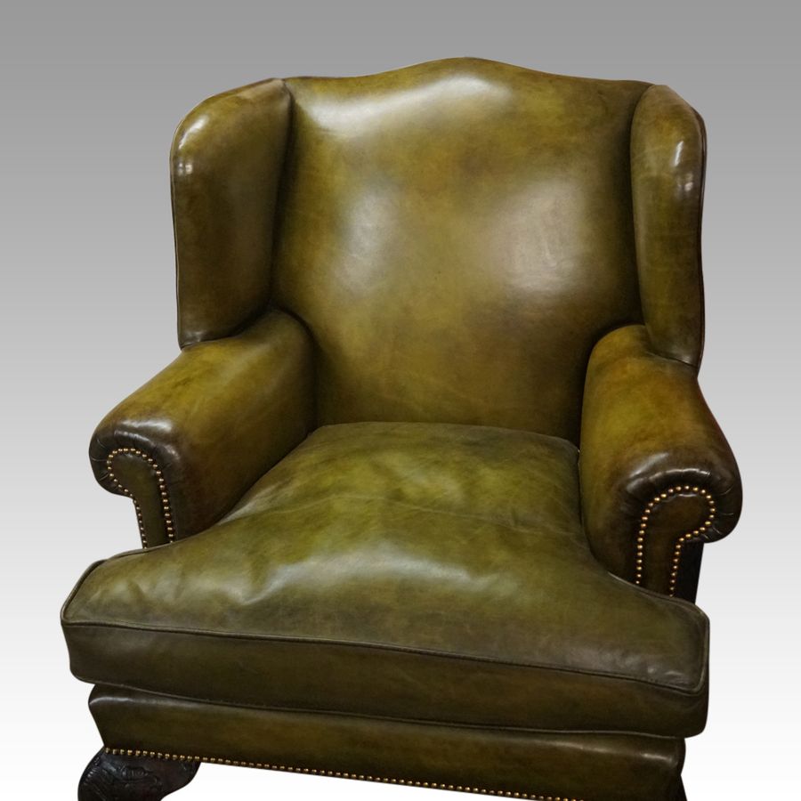 Antique Antique Irish green leather wingchairs