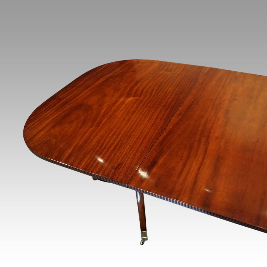 Antique Regency style mahogany dining table