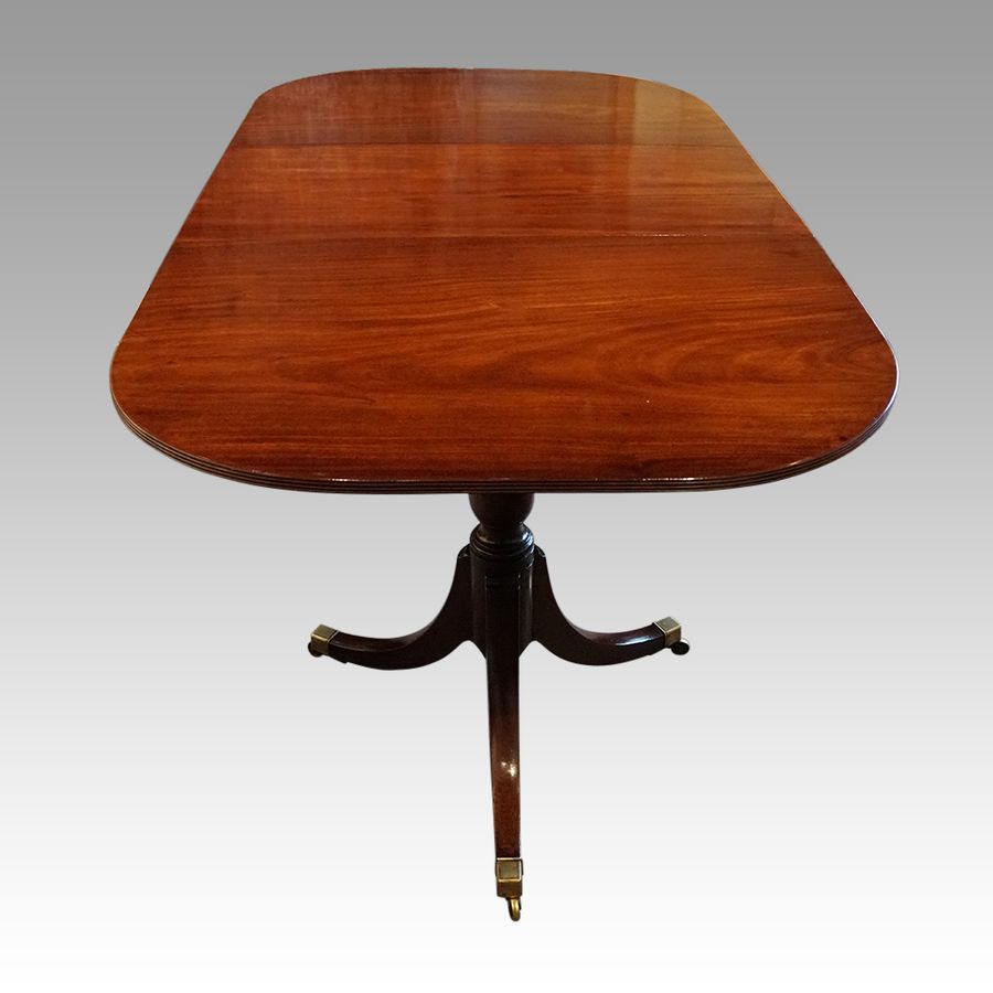 Antique Regency style mahogany dining table