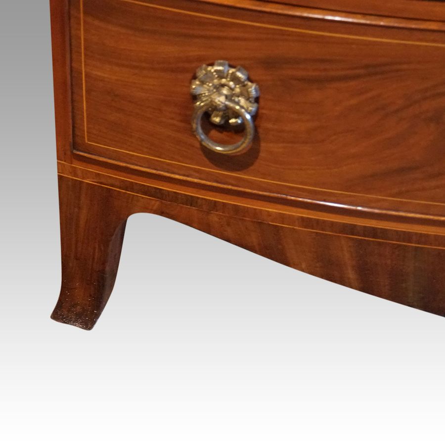 Antique Regency mahogany bow front chest